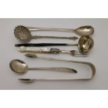 Chawner & Co. A pair of silver sugar tongs, engine turned decoration, London 1859, a Victorian