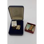 A 9ct gold locket, inset cameo, a 'Kerval & Co. Aberdeen' 9ct gold mounted miniature bottle of North