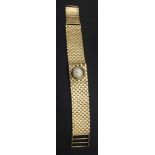 A 'Jaeger-Le Coultre' ladies 9ct gold bracelet wristwatch, the strap 2cm wide, length: 18.5cm (