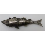 A Continental silver reticulated fish, having hinged opening head, c.1900, stamped .925, 13cm long