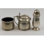 Ernest W. Haywood, A three piece silver condiment set of plain form, comprising; lidded mustard (