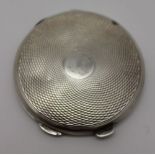 Clark & Sewell, a circular silver powder compact, engine turned