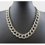 A silver choker type neck chain, double link form, stamped .925, 46cm long, 110g