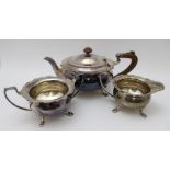 William Suckling Ltd. A silver three-piece tea set, squat form with decorative piecrust rim, each