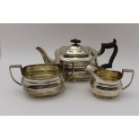 Goldsmiths & Silversmiths Company Ltd, Regent Street, London, A three-piece silver tea set of