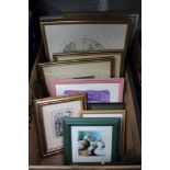 A box containing a selection of decorative pictures, prints, and frames various