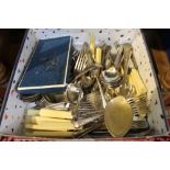 A box containing a selection of cutlery various, together with two boxed Royal Worcester dishes