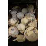 A box containing a good selection of crown Staffordshire floral decorated tea wares