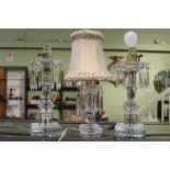 A pair of glass lustre table lamps, together with another similar smaller