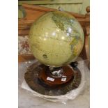 An illuminating table globe of German manufacturer, together with a series of polished metal under