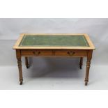 A 19th-century oak and green leather top writing desk, writing desk dress having two drawers, a pion