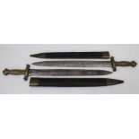 Two 19th century French short swords of Gladius design with brass handles and steel blades. Both sta