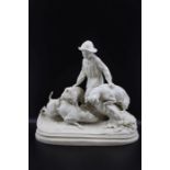 A 19th century Copeland parian figure group of a boy with three dogs