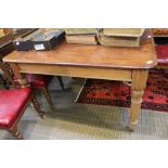 A part 19th century mixed wood kitchen table with cutlery drawer