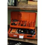 Fishing tackle box containing a number of reels