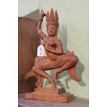 A 20th century carved wood Cambodian dancer on plinth base, 33.5cm high, inset seal mark to base 'Ar