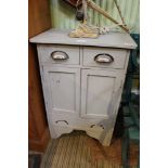 A grey painted side cabinet