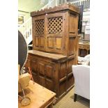 An early 17th century low Countries oak & probably chestnut food cupboard, top with studded shaped f