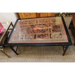 A gloss black faux bamboo rectangualr coffee table, with inset glass top, over hand painted lacquer