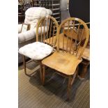 Two stick back chairs