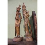 Two Balinese carved wood elegant figures tallest, 55cm high