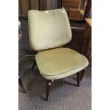 A mid century design registered single chair, with gold velour over horsehair upholstery
