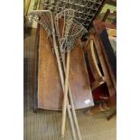 Three vintage Lacrosse sticks, stamped various maker's marks