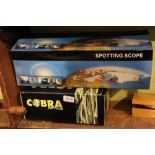 1x cobra optic night vision spotting scope with a generic tripod mounted spotting scope