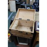 A metal bound soft wood box