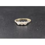 A three stone diamond ring