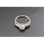 A diamond ring, set with a brilliant cut diamond,