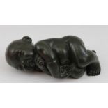 A 20th century cast bronze depicting a sleeping baby, 13cm