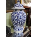 A pair of modern Oriental design blue and white vases.