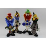 A collection of four Murano glass clowns, the tallest 23cm