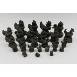 A collection of 19th century bronze Burmese opium weights