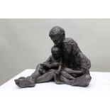 Angela Palmer, a terracotta with bronze resin seated mother with children reading (number 143)