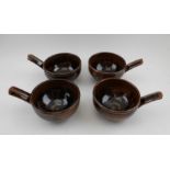 Michael Leach, A set of four studio pottery glazed stoneware