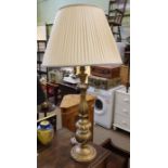 A gilt table lamp