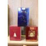 Three boxed Bells Commemorative Whisky Decanters, sealed with contents