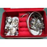 A small jewellery box containing costume jewellery and hallmarked silver items, various