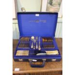 A cased set of part plated cutlery (Gold)