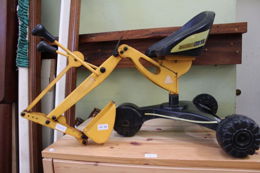 A John Deere branded yellow & black finished three wheeled, childs' manual digger