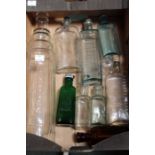An Essolube motor oil bottle, 1 quart, a "Boots the Chemist" bottle and other bottles various