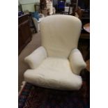 Cream upholstered easy chair