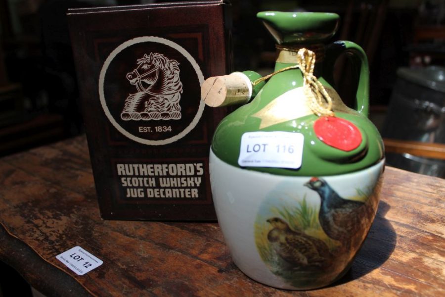 Rutherford's 12 year old whisky, in ceramic flagon, with original box