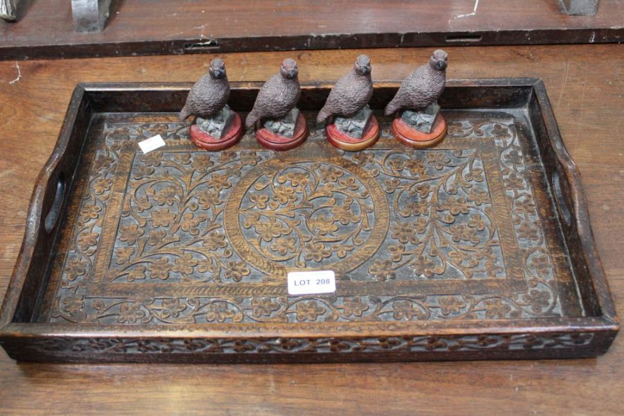 Four models of "The Famous Grouse", with a carved wooden rectangular tray