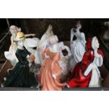 Seven porcelain females by leading brand names