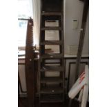 A vintage set of wooden ladders