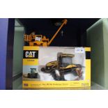 Two CAT model heavy plant machines one boxed