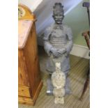Two freestanding reproduction terracotta warriors
